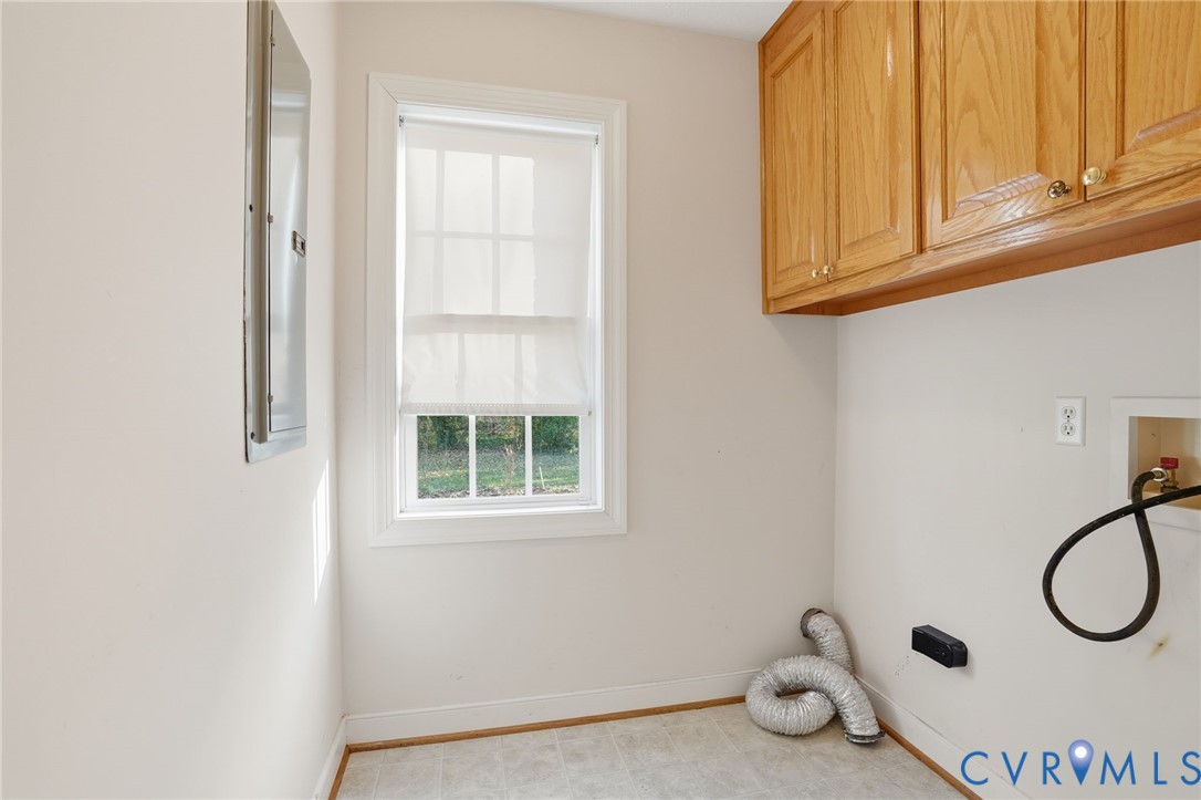 8420 Lee Davis Road Mechanicsville, VA 23116 - Photo 33 of 45 a view of a storage and utility room with windows
