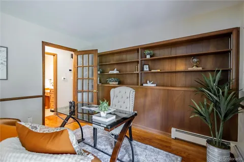 a living room with a couch and a table