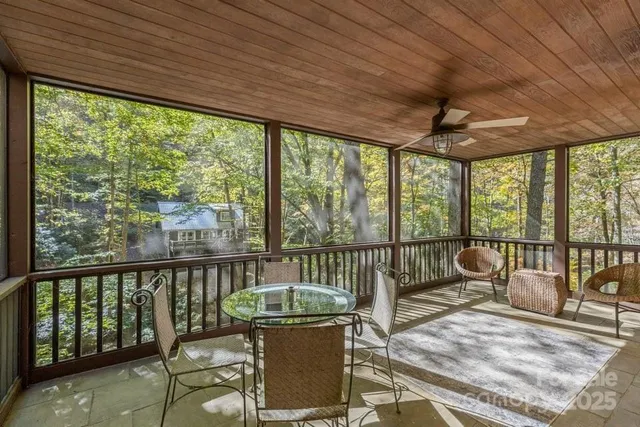 a view of a chair and table in the balcony