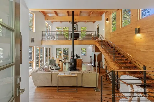 a view of living room with furniture and windows