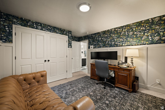 204 Lyman Lane Bountiful, UT 84010 - Photo 15 of 28 Interior room featuring white board and batten wainscoting with botanical wallpaper, ceiling-mounted lighting, and paneled doors