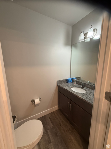 485 370 South Preston, ID 83263 - Photo 8 of 16 Bathroom with vanity and dark wood finished floors