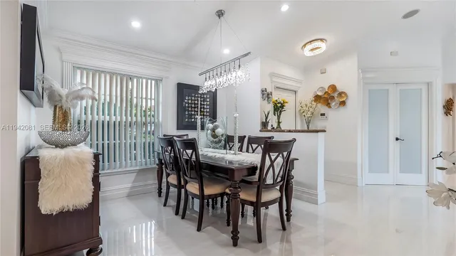 a kitchen with a sink stainless steel appliances and cabinets