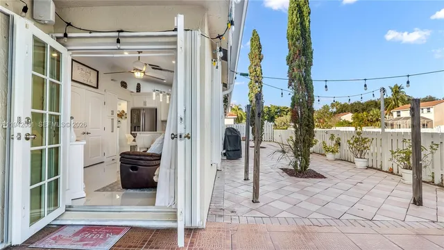 a view of a street with benches