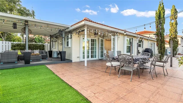 a outdoor living space with furniture and garden view
