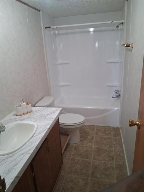 110 Pecan Street Gloster, LA 71030 - Photo 6 of 7 a bathroom with a sink a toilet and shower