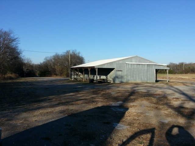 1796 Alsup Mill Road Lascassas, TN 37085 - Photo 3 of 4 a front view of a house with a yard