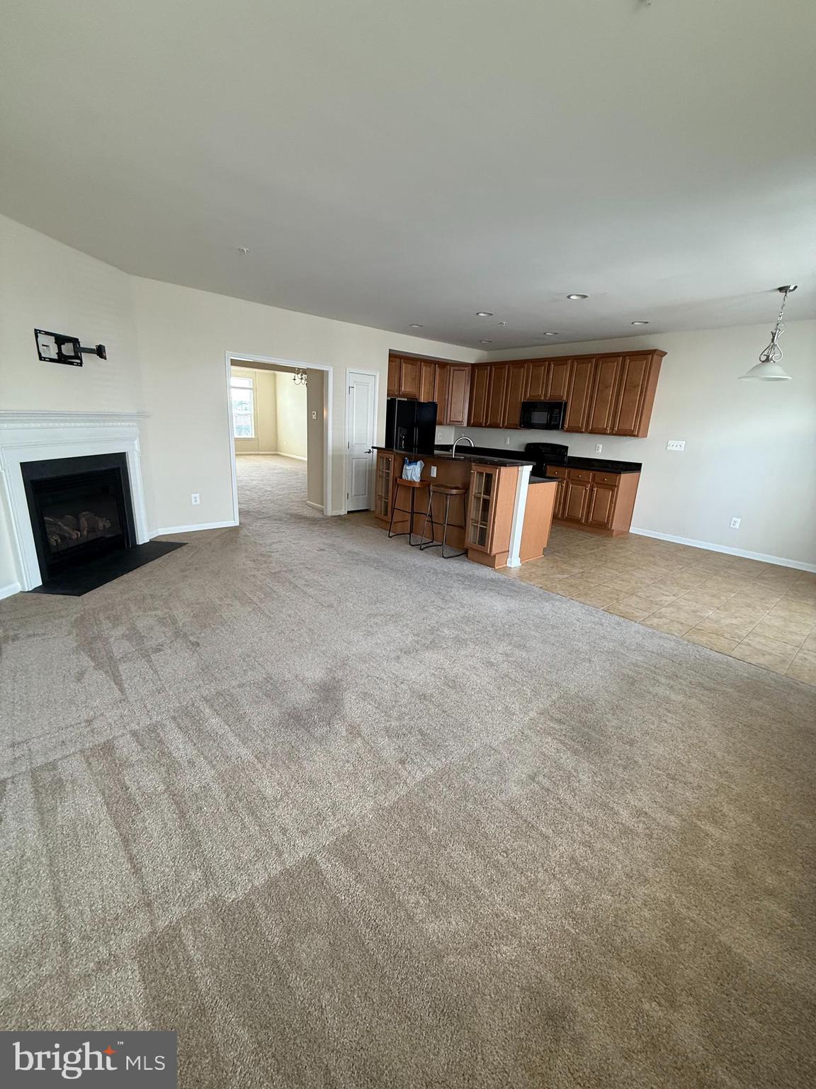 202 B Mill Pond Road Frederick, MD 21701 - Photo 11 of 44 a view of a livingroom with furniture and a window