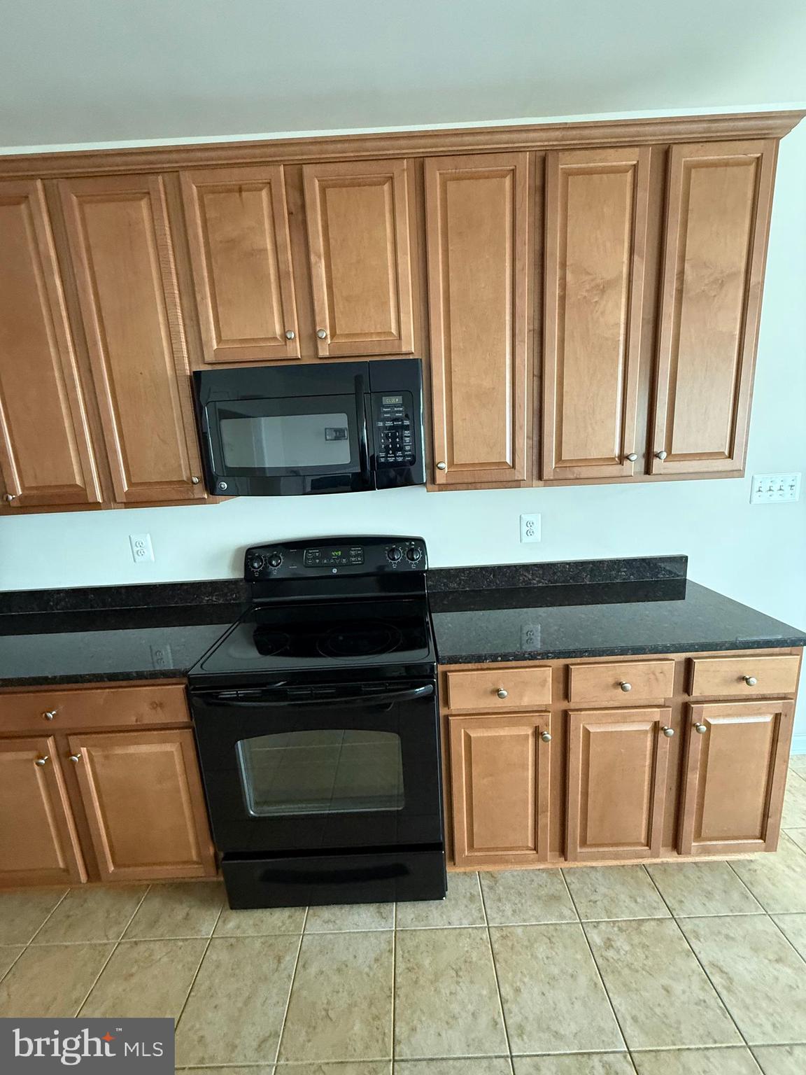 202 B Mill Pond Road Frederick, MD 21701 - Photo 18 of 44 a stove top oven sitting inside of a kitchen