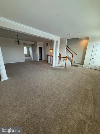 a view of a livingroom with a staircase