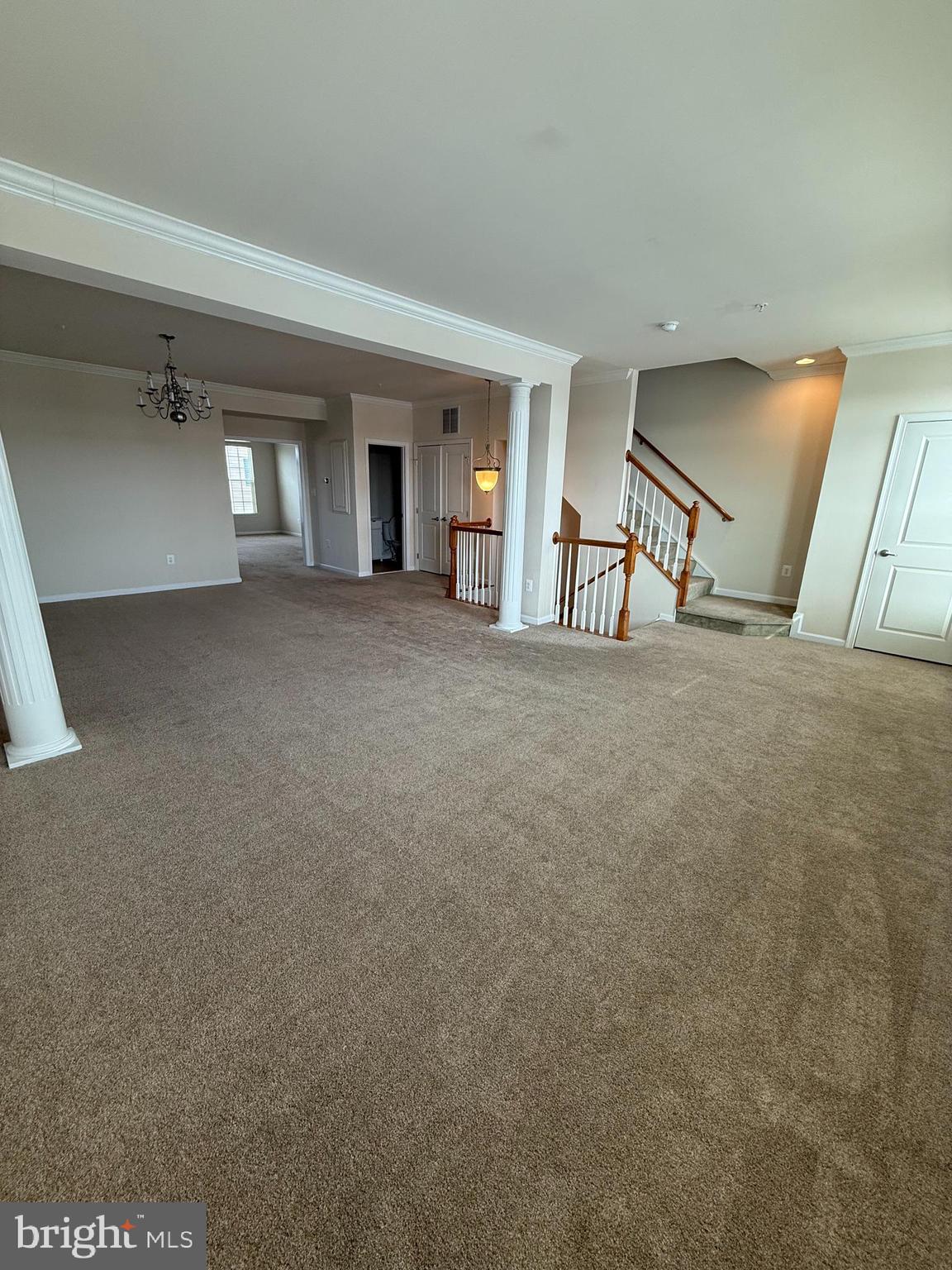 202 B Mill Pond Road Frederick, MD 21701 - Photo 3 of 44 a view of a livingroom with a staircase