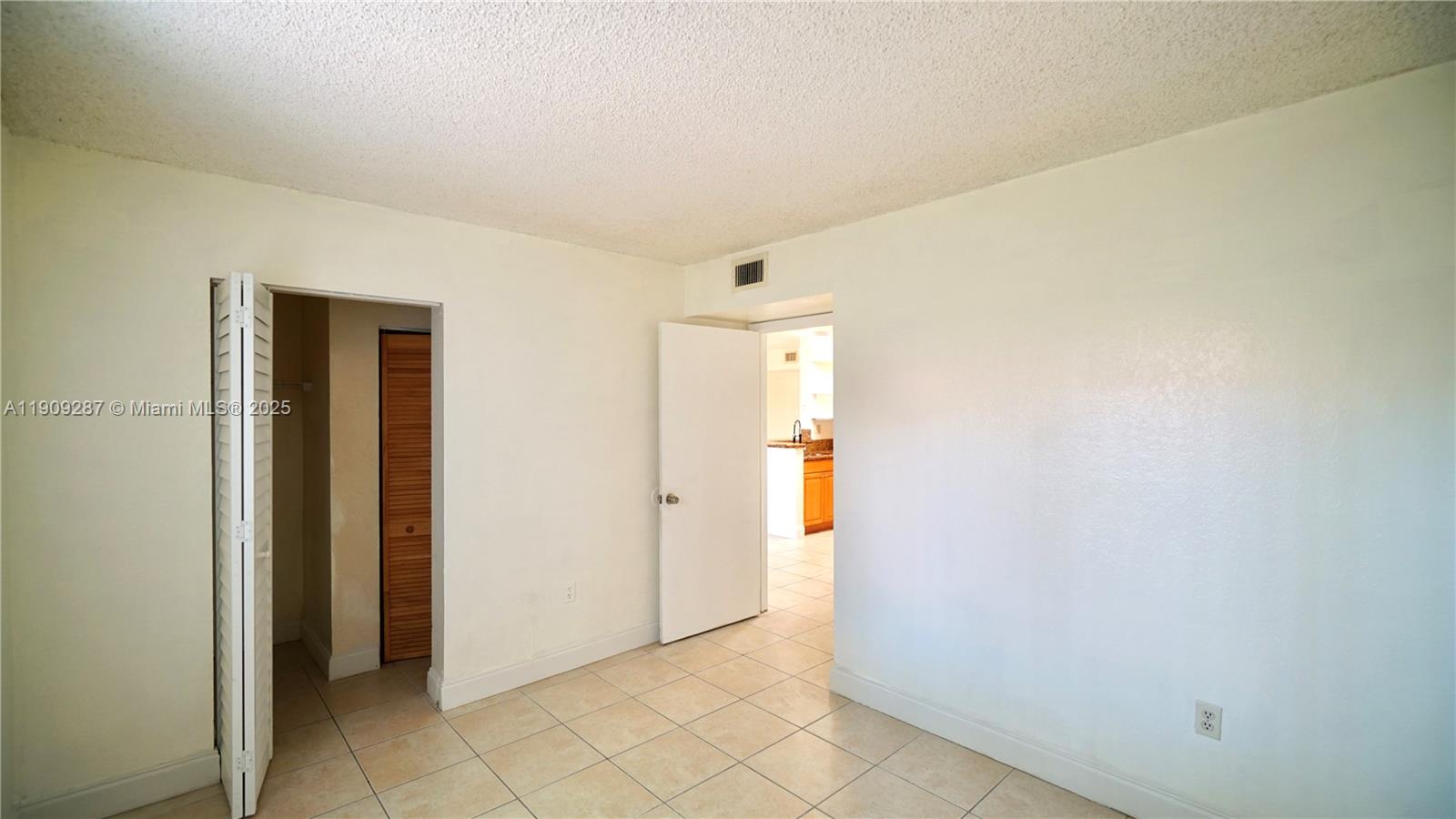 15231 Southwest 80th Street, Unit 101 Miami, FL 33193 - Photo 12 of 19 a view of an empty room