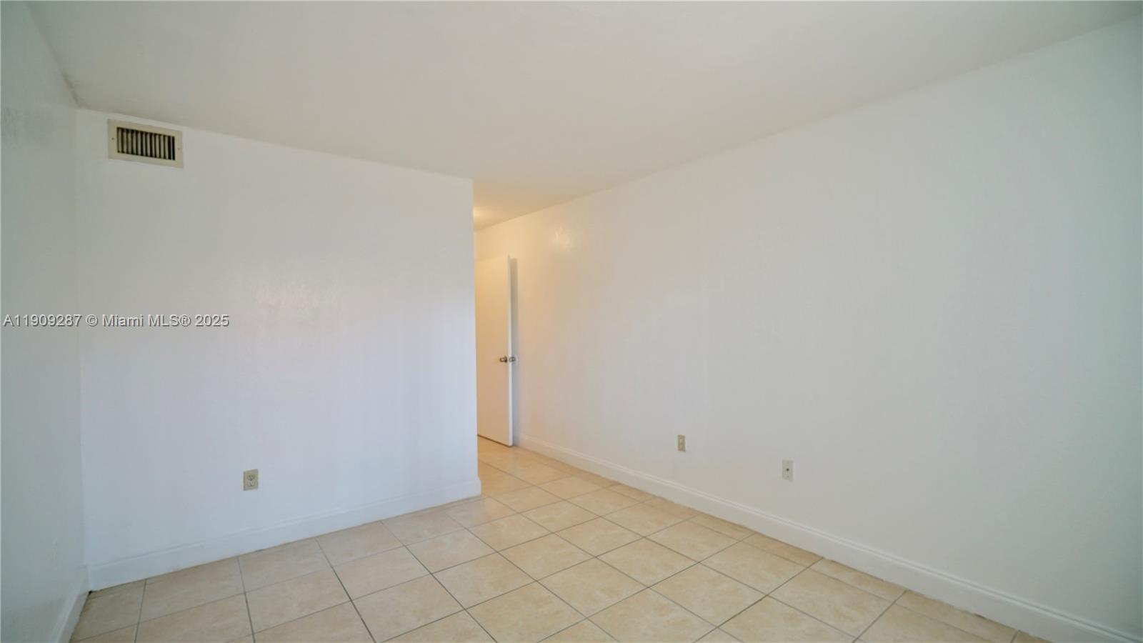 15231 Southwest 80th Street, Unit 101 Miami, FL 33193 - Photo 16 of 19 a view of an empty room