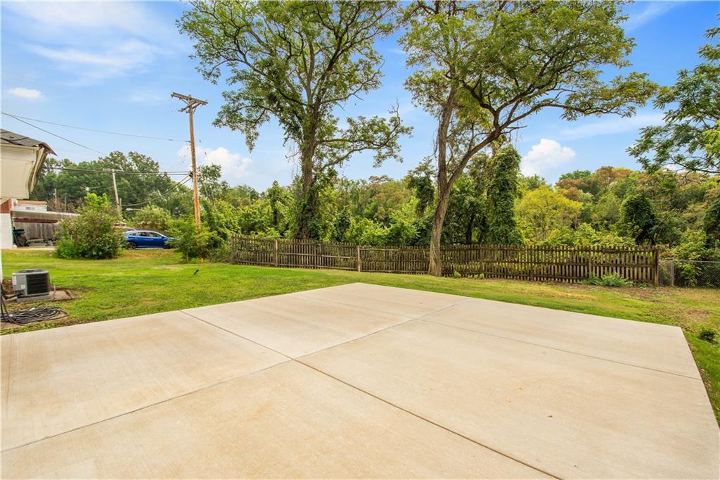 203 Skyport Road West Mifflin, PA 15122 - Photo 9 of 29 Rear Concrete Pad for ease of garage entry