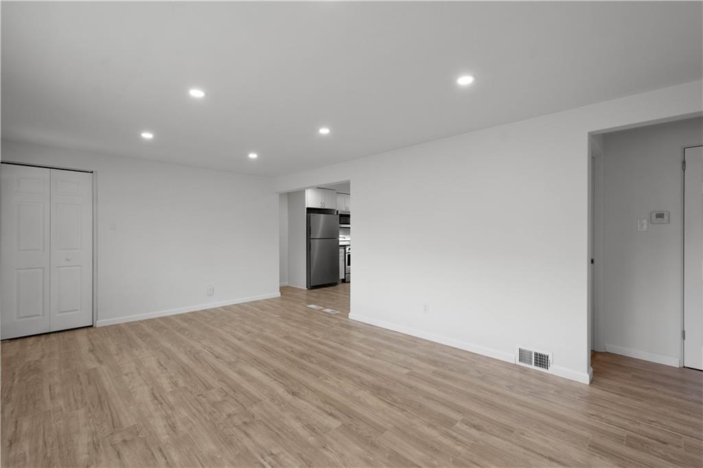 203 Skyport Road West Mifflin, PA 15122 - Photo 10 of 29 New Laminate Flooring Throughout the Main Floor