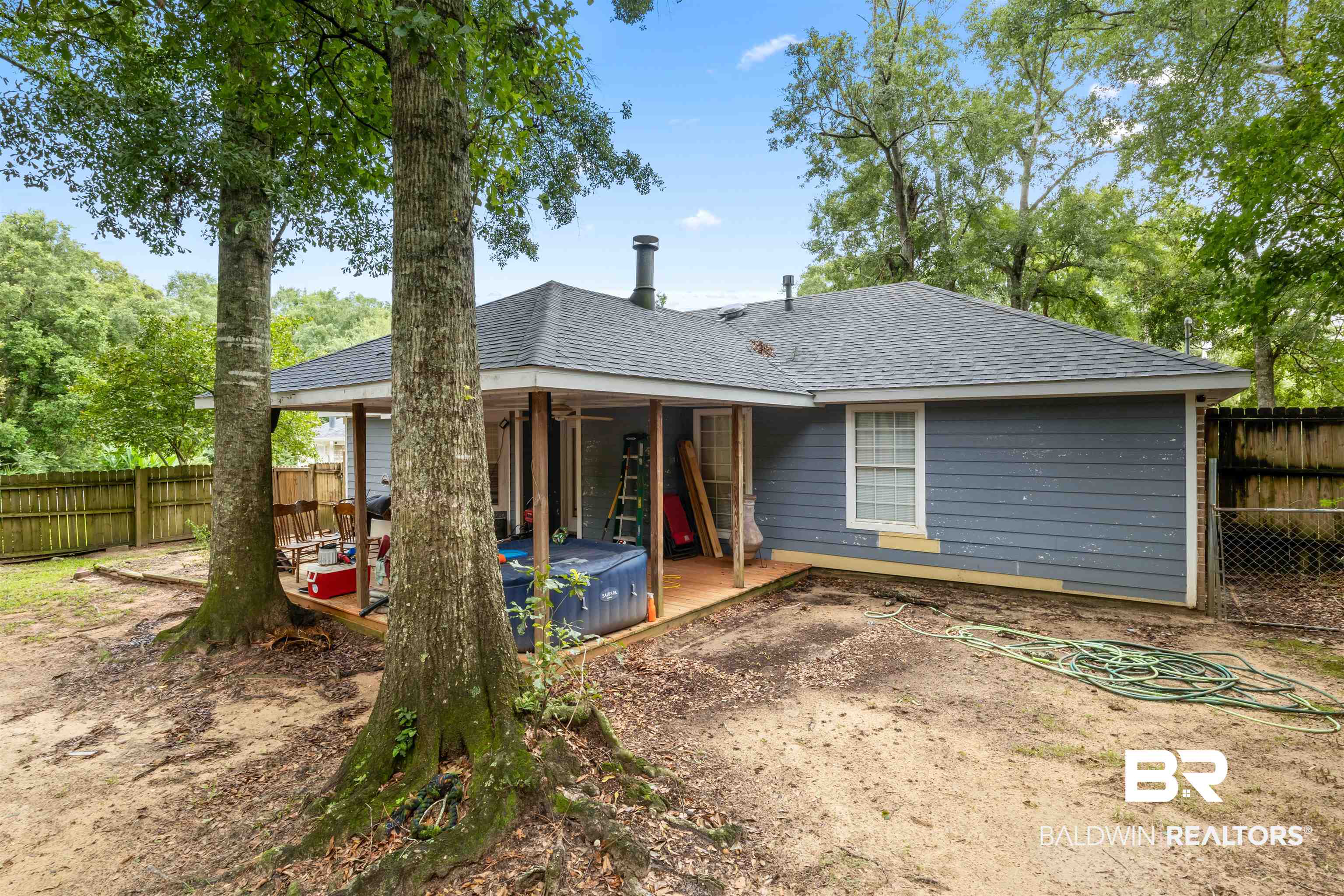 1345 Baker Court Mobile, AL 36695 - Photo 23 of 28 Rear view of property with a deck