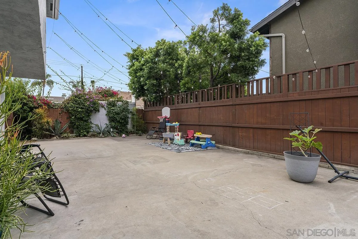 3539 Granada Avenue San Diego, CA 92104 - Photo 26 of 35 a view of a chair and table in the backyard