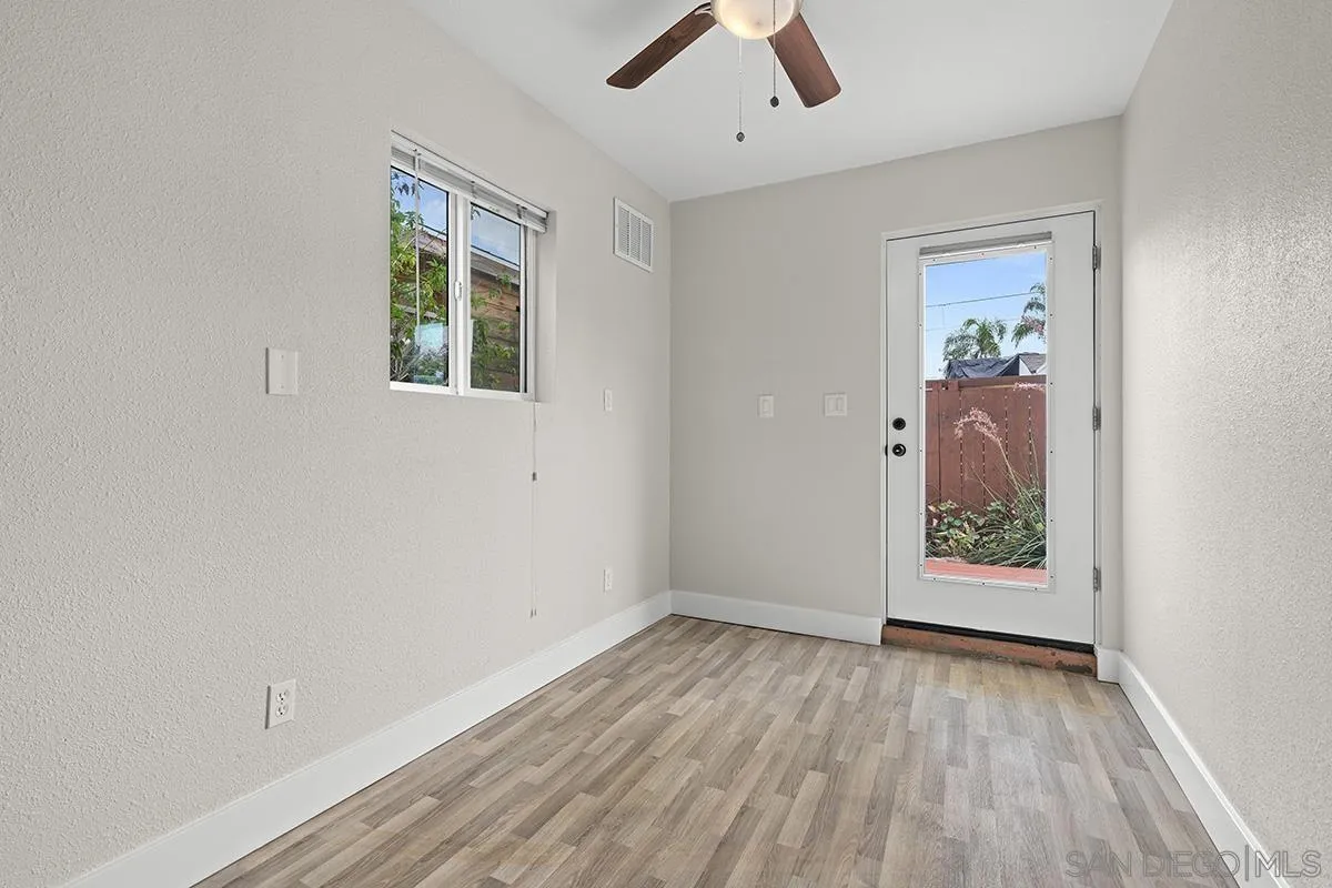 3539 Granada Avenue San Diego, CA 92104 - Photo 29 of 35 wooden floor in an empty room with a window