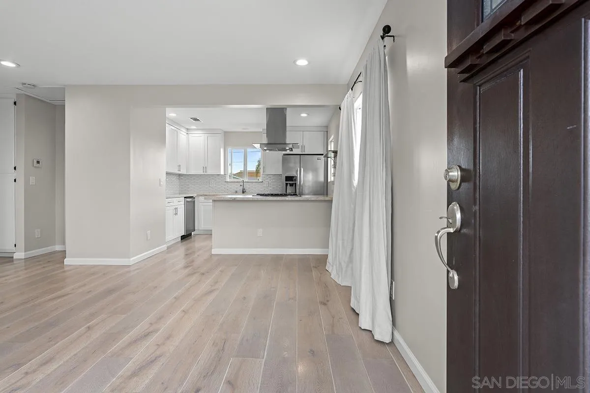 3539 Granada Avenue San Diego, CA 92104 - Photo 8 of 35 a view of a kitchen from the hallway
