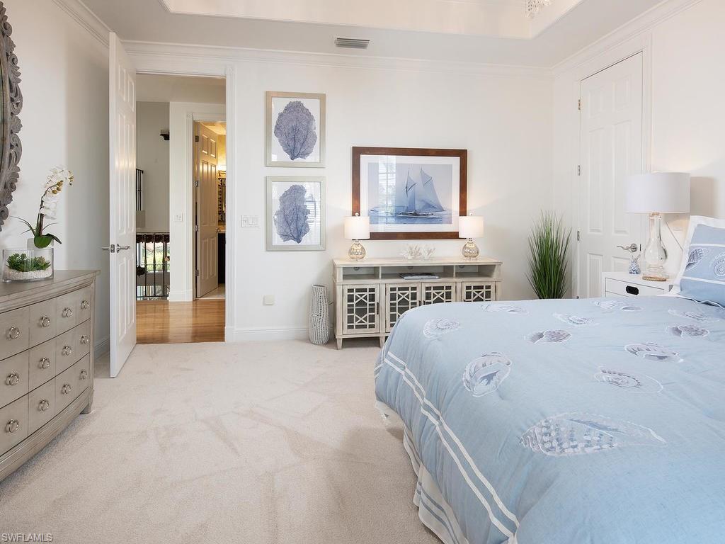 720 17th Avenue South Naples, FL 34102 - Photo 14 of 33 a large white bed in a white room