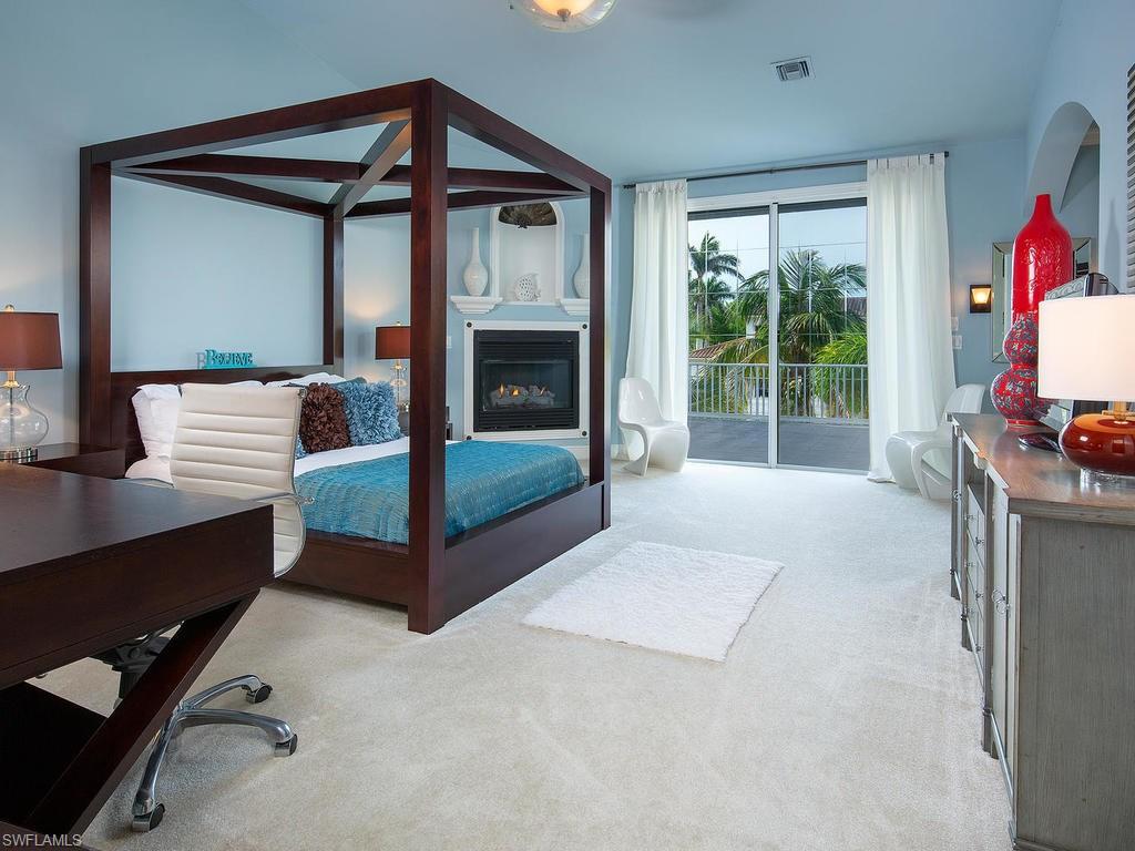720 17th Avenue South Naples, FL 34102 - Photo 15 of 33 a view of a livingroom with furniture and front door