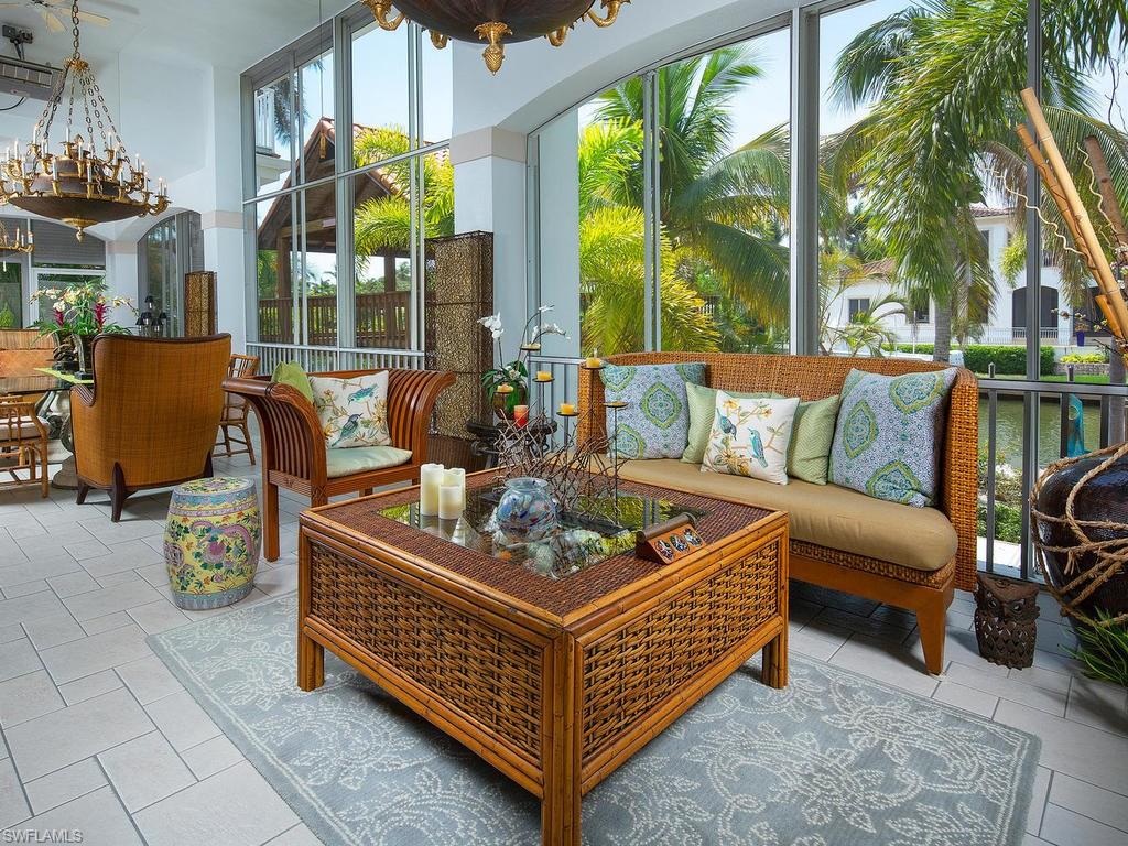720 17th Avenue South Naples, FL 34102 - Photo 22 of 33 a outdoor living space with furniture and garden view
