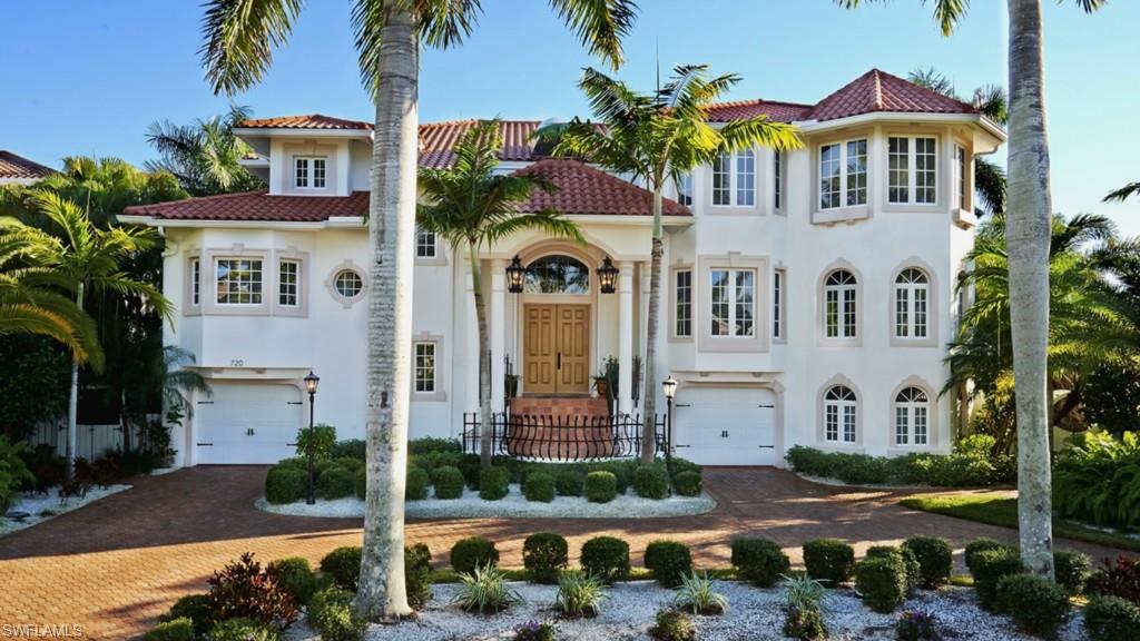 720 17th Avenue South Naples, FL 34102 - Photo 32 of 33 a front view of a multi story residential apartment building