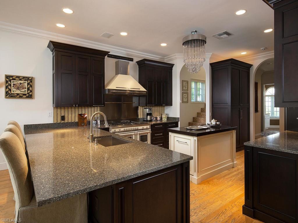 720 17th Avenue South Naples, FL 34102 - Photo 5 of 33 a kitchen with granite countertop lots of counter top space