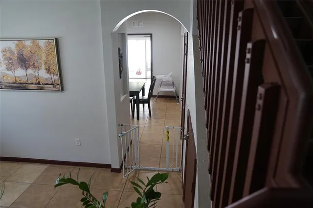 a vase of flowers sitting on a table