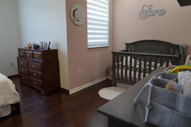 a bedroom with a bed and a closet