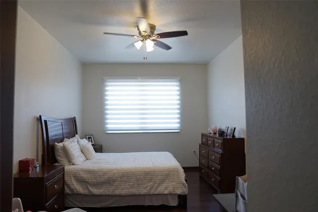 a room with furniture and a flat screen tv