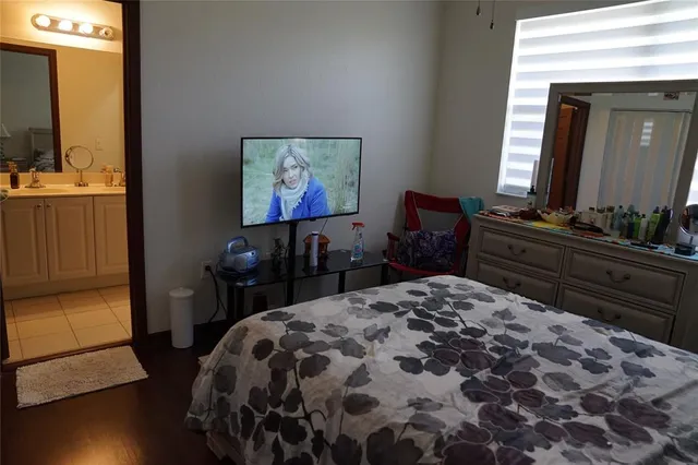 a bathroom with a sink and mirror