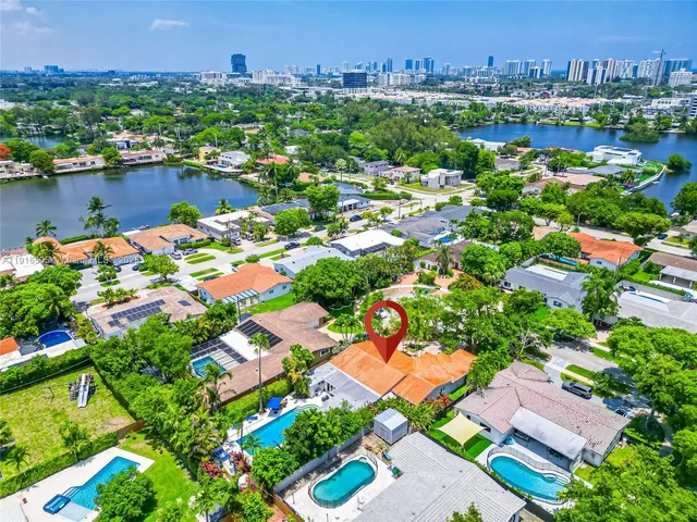 a view of lake and houses with outdoor space