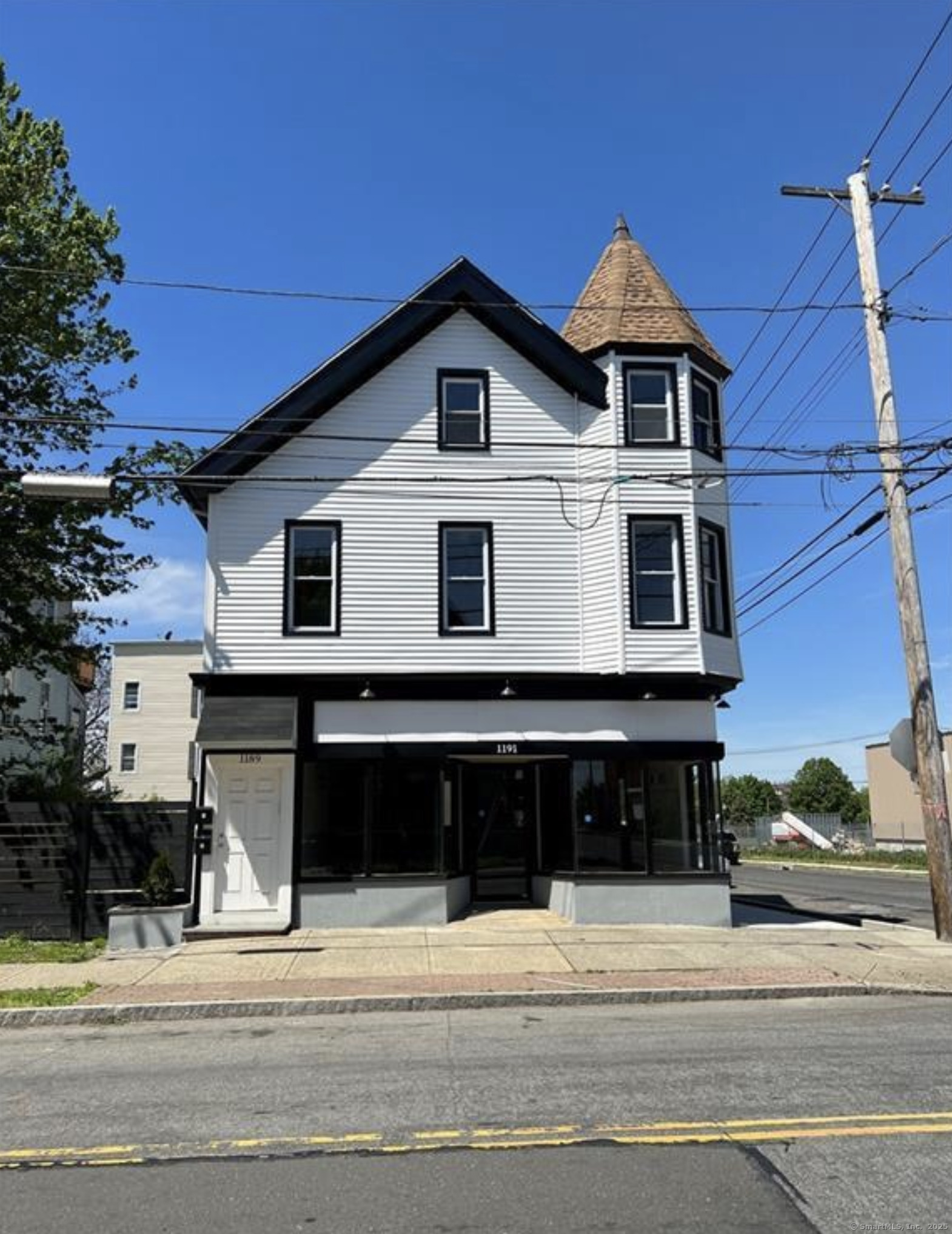 Undisclosed Address Bridgeport, CT 06607 - Photo 2 of 36 a front view of a house with a yard