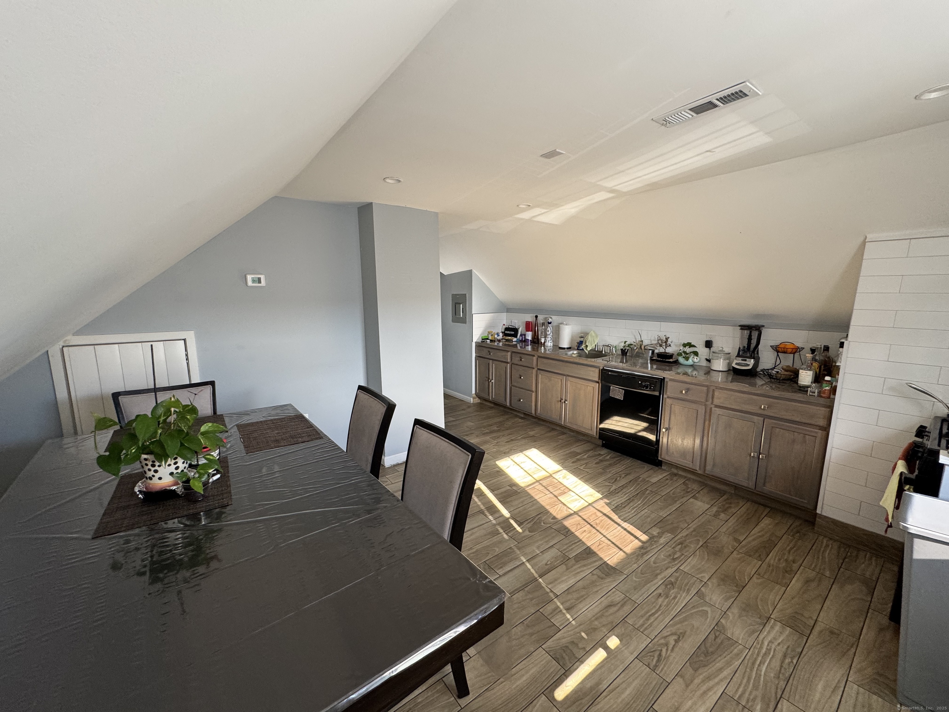 Undisclosed Address Bridgeport, CT 06607 - Photo 21 of 36 a kitchen with furniture wooden floor and stainless steel appliances