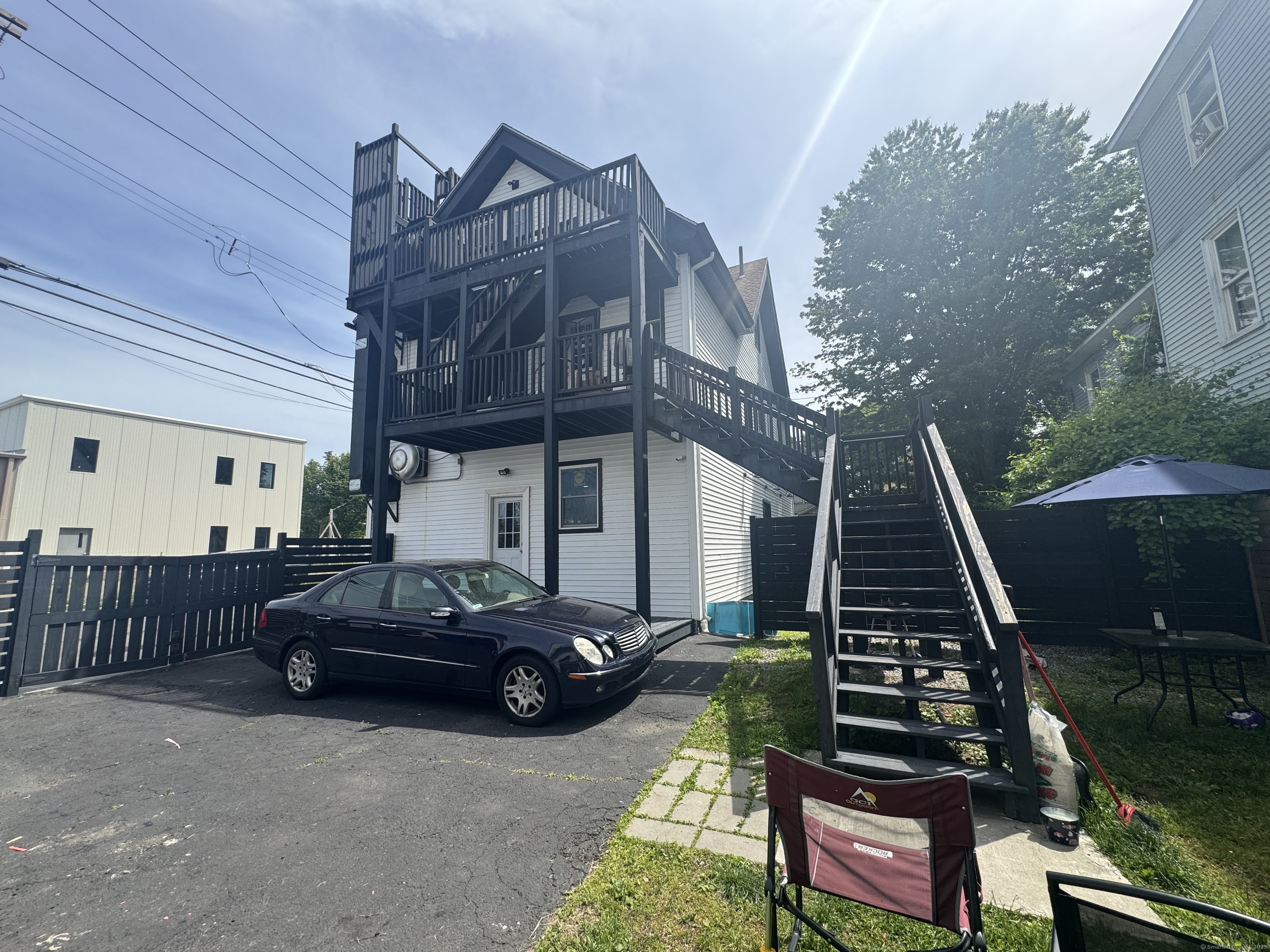 Undisclosed Address Bridgeport, CT 06607 - Photo 30 of 36 a view of a couches and dinning table in the patio