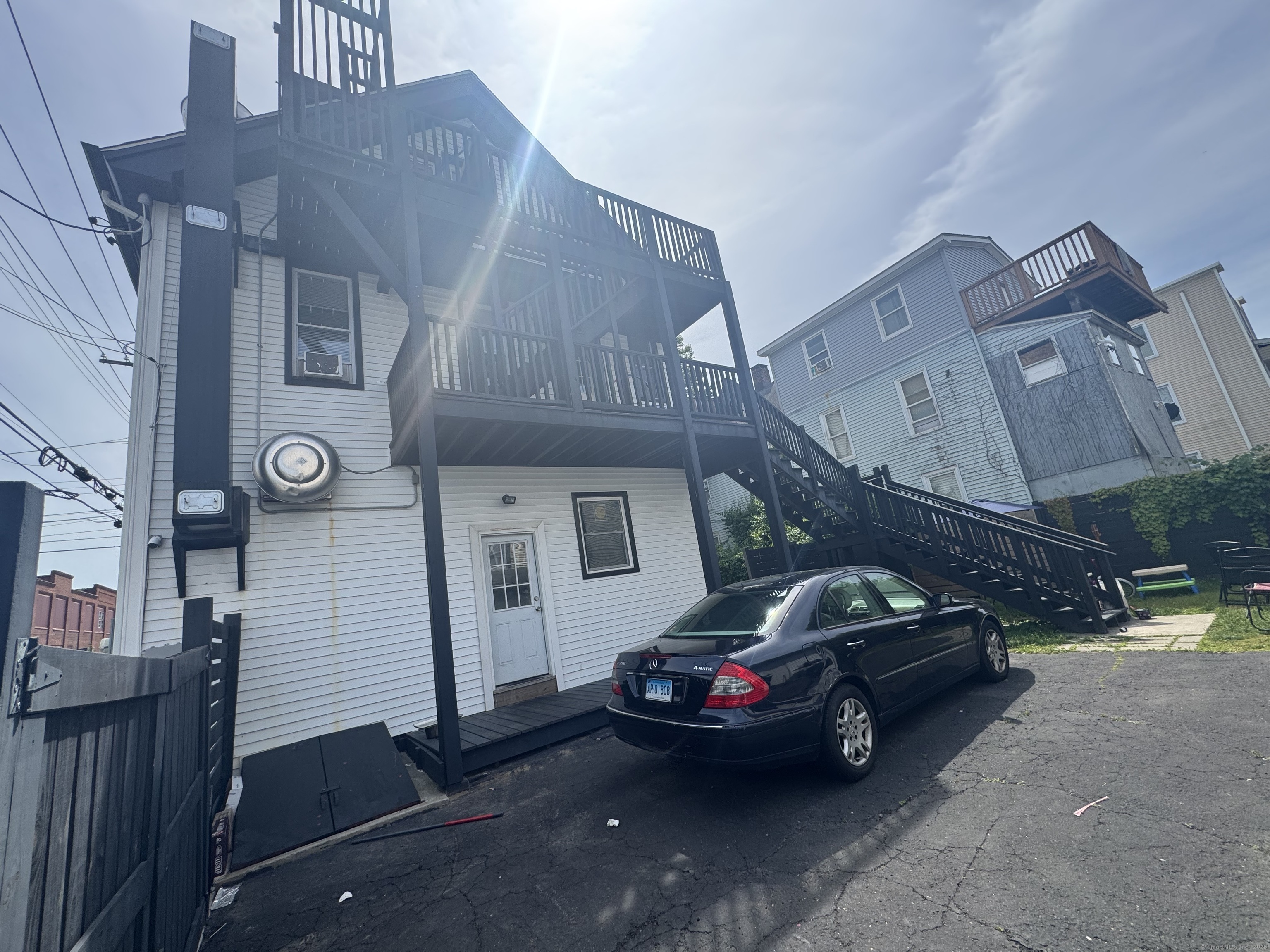 Undisclosed Address Bridgeport, CT 06607 - Photo 33 of 36 a view of a car in a parking lot