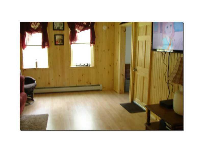 441 Wiswell Road Holden, ME 04429 - Photo 13 of 27 Living Room. All new windows