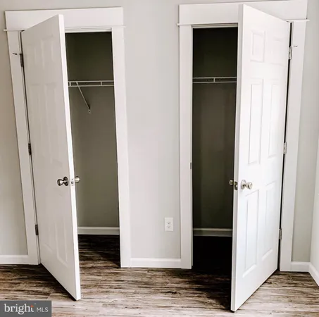 a view of a walk in closet and bedroom