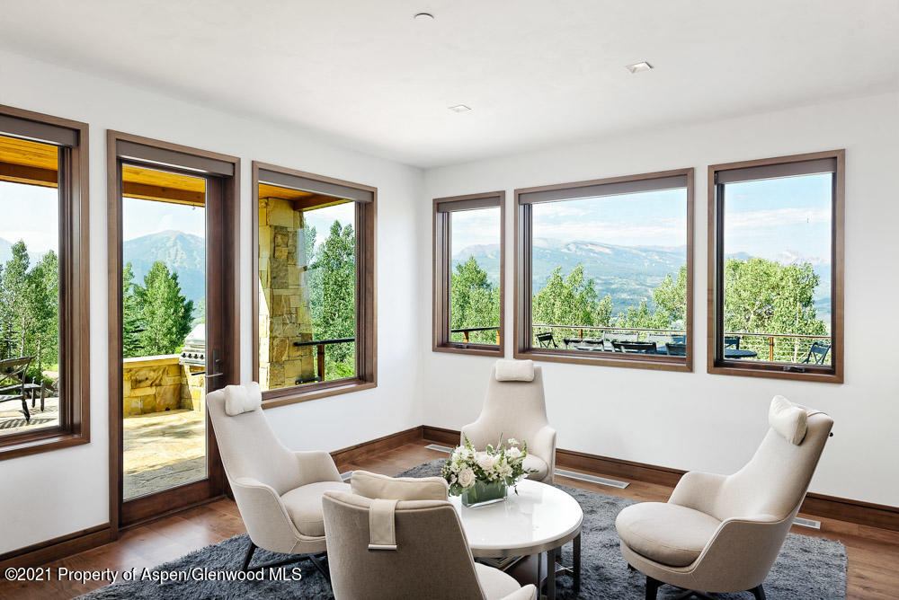70 Larson Road Aspen, CO 81612 - Photo 21 of 64 a dining room with furniture and window