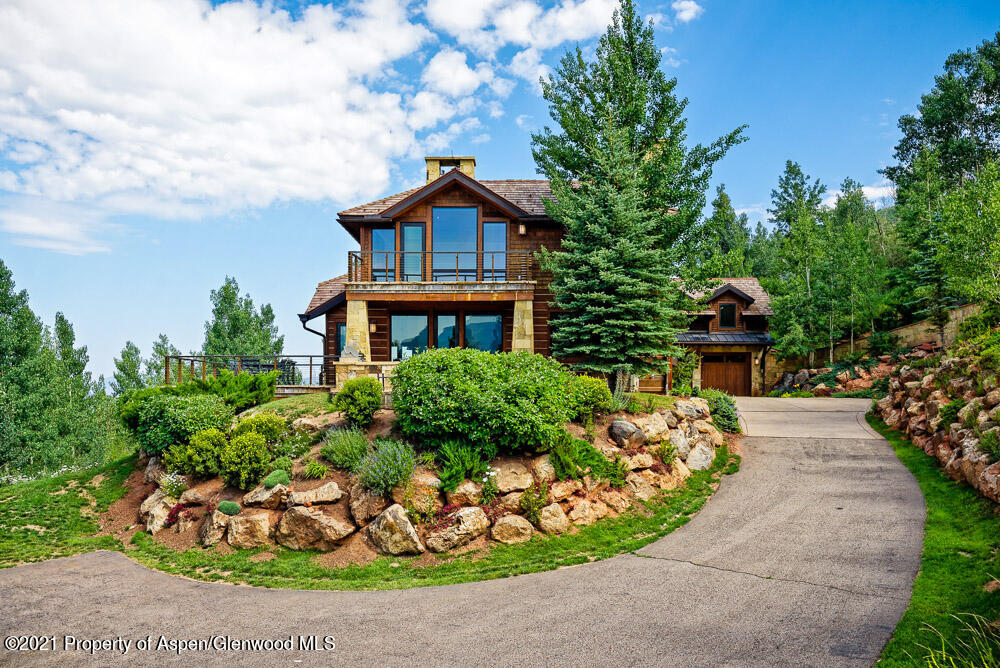 70 Larson Road Aspen, CO 81612 - Photo 41 of 64 a front view of a house with a yard