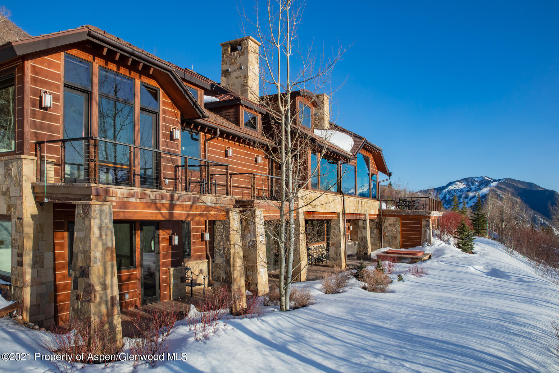 70 Larson Road Aspen, CO 81612 - Photo 43 of 64 a front view of a building with street view