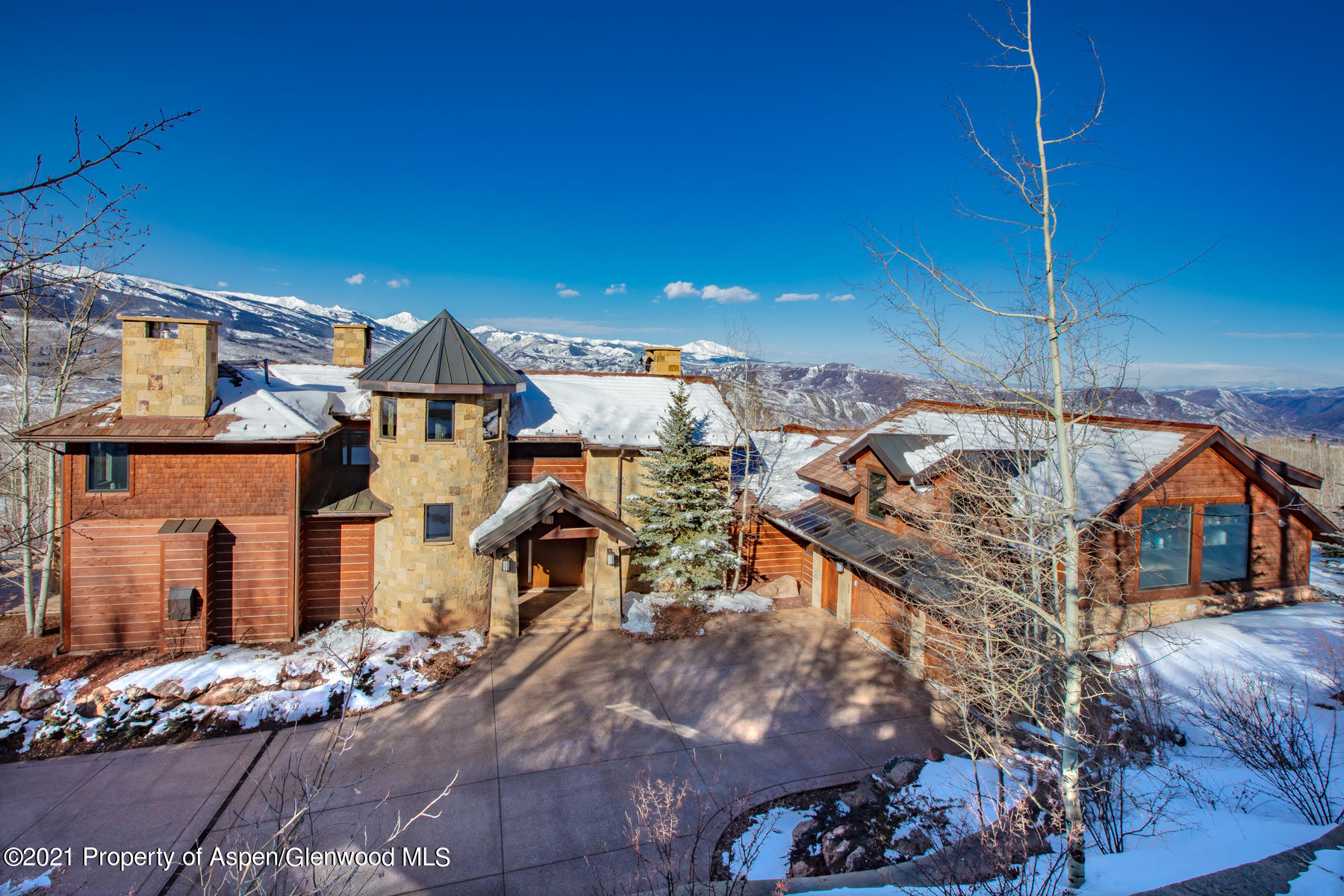 70 Larson Road Aspen, CO 81612 - Photo 44 of 64 a view of a house with a patio