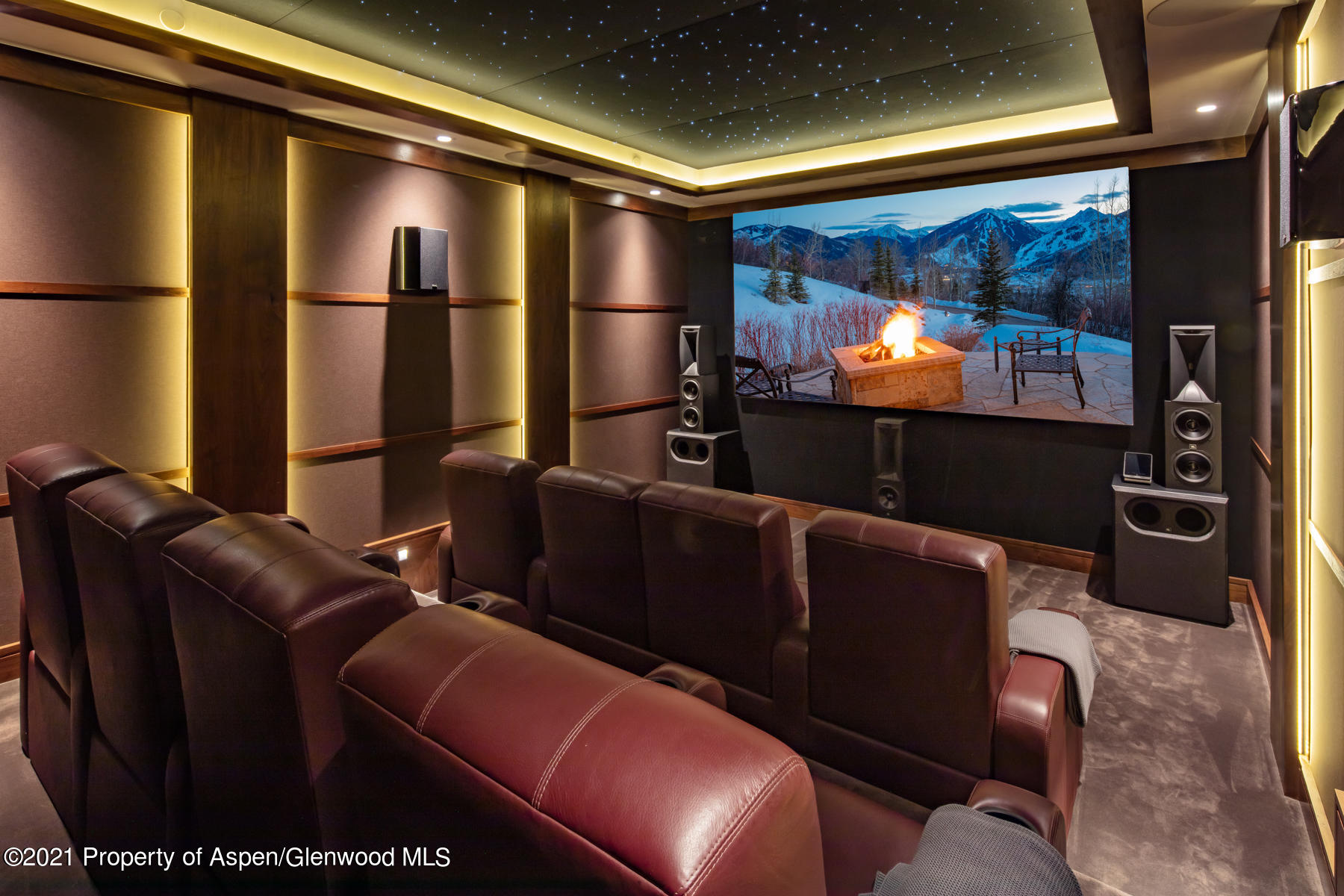 70 Larson Road Aspen, CO 81612 - Photo 8 of 64 a room with furniture projector and screen