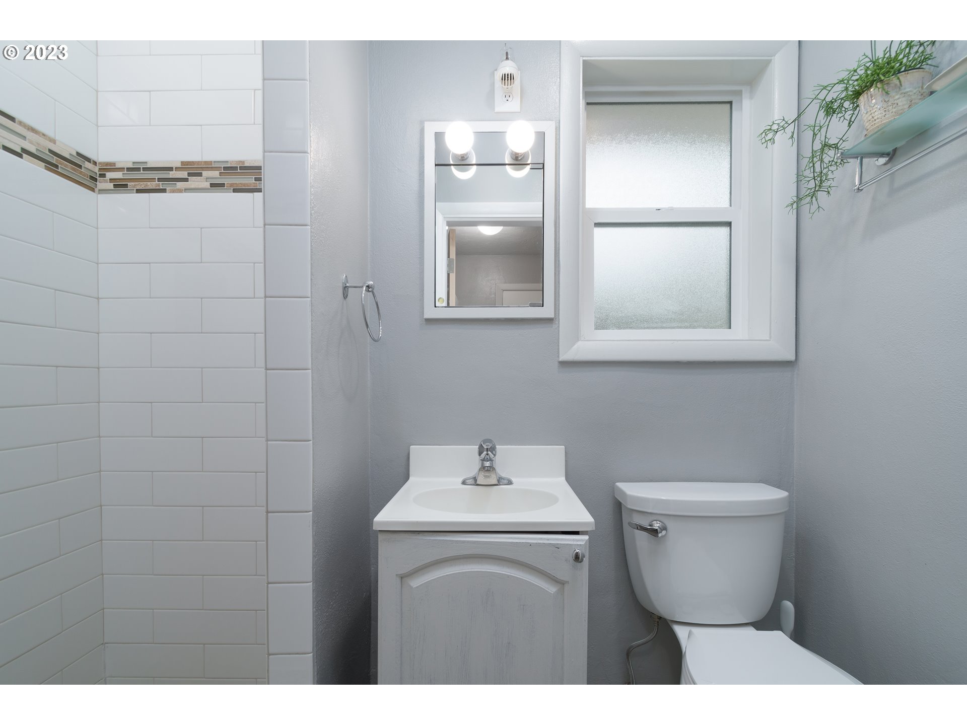 3950 Donald Street Eugene, OR 97405 - Photo 20 of 33 a bathroom with a sink toilet and mirror