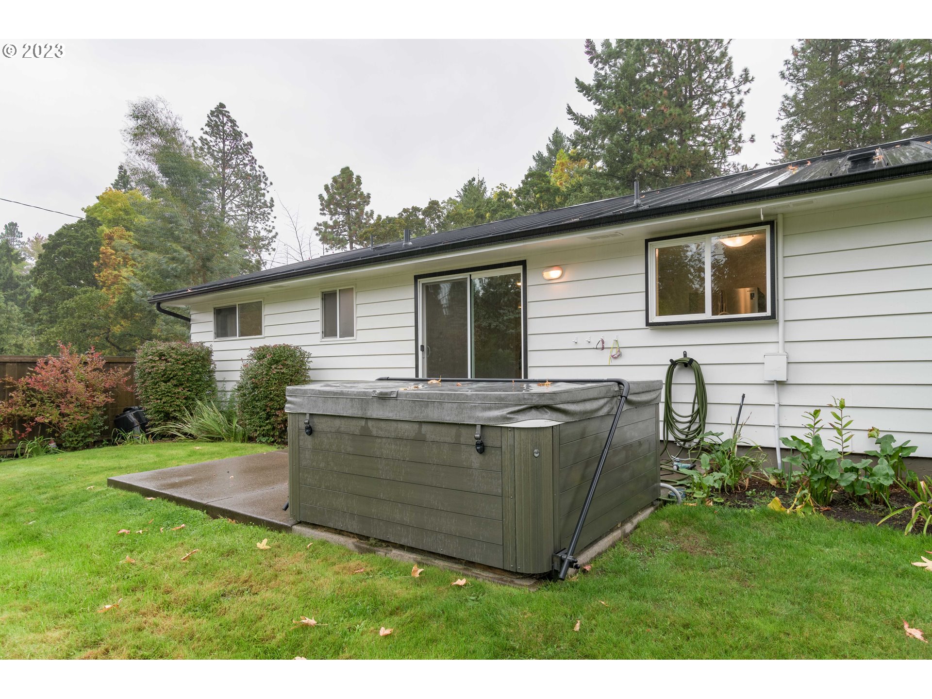 3950 Donald Street Eugene, OR 97405 - Photo 30 of 33 a view of house with backyard