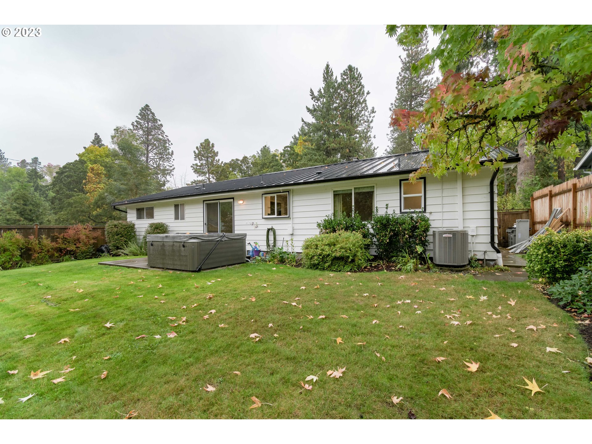 3950 Donald Street Eugene, OR 97405 - Photo 31 of 33 a view of a house with backyard and garden