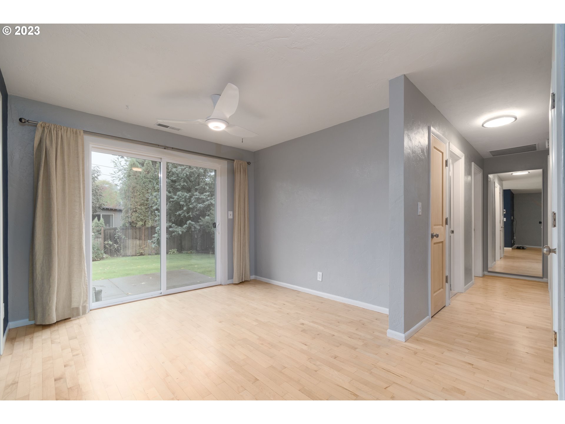 3950 Donald Street Eugene, OR 97405 - Photo 10 of 33 a view of empty room with wooden floor