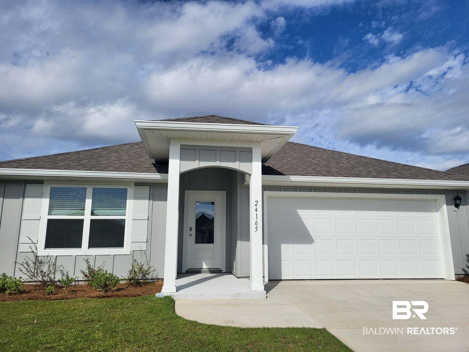24165 Lanai Lane Elberta, AL 36530 - Photo 1 of 2 View of front facade with a garage