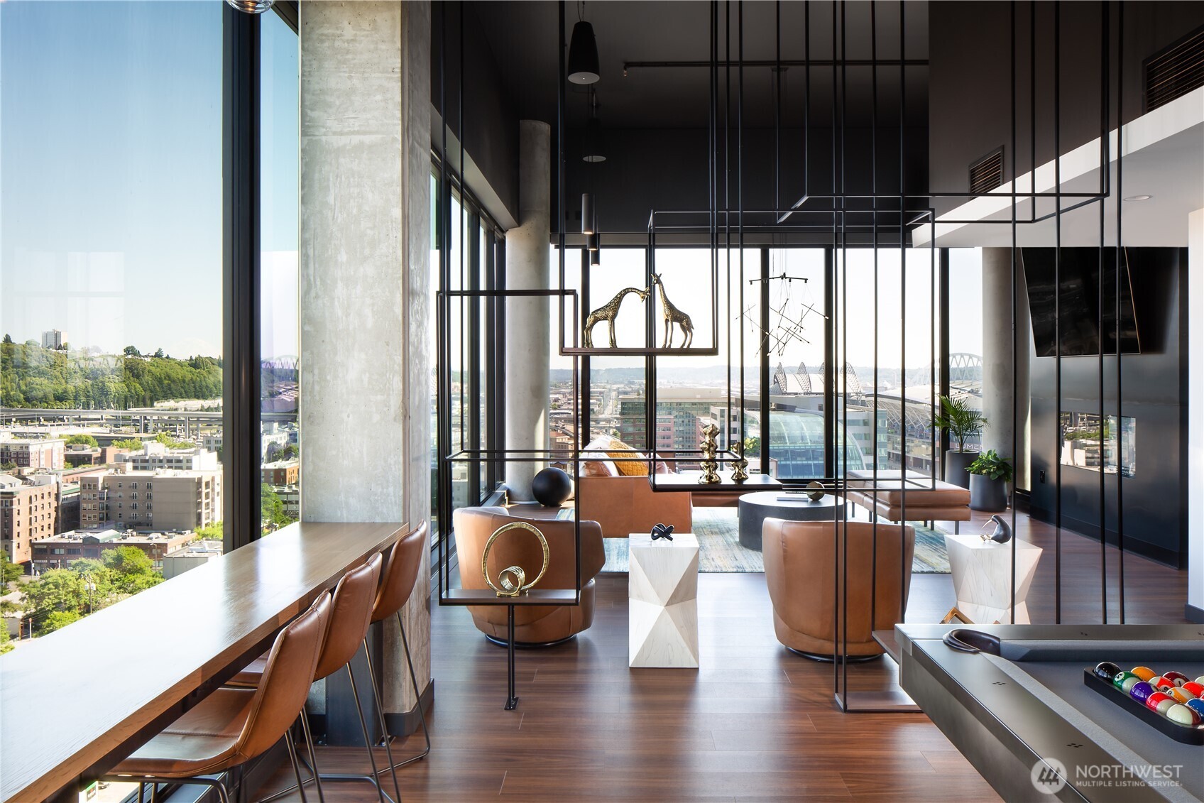 450 South Main Street, Unit 1102 Seattle, WA 98104 - Photo 17 of 26 a living room with furniture floor to ceiling window and wooden floor